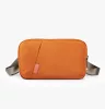 Uniq Arden Voyage táska / rendszerező, mobiltelefon tartó, válltáska / övtáska, vízálló, 1,5L, narancs